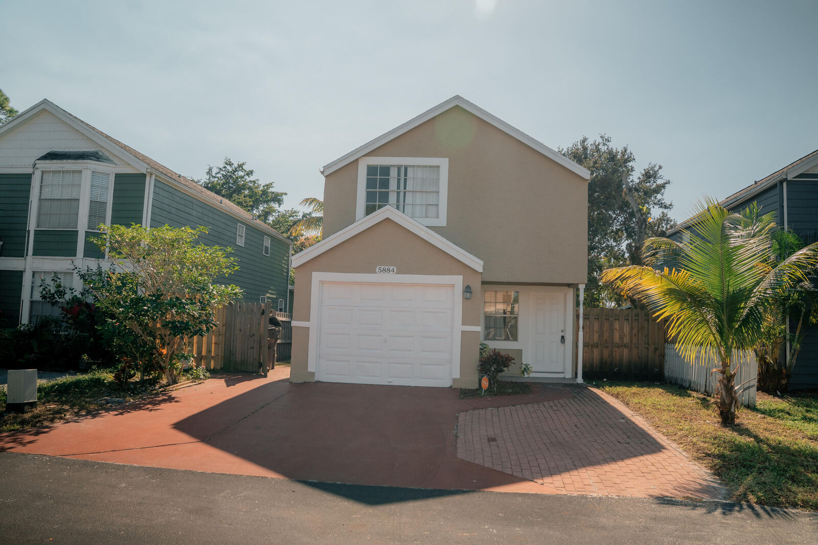 Property Photo: 5884 Dewberry Way FL 33415