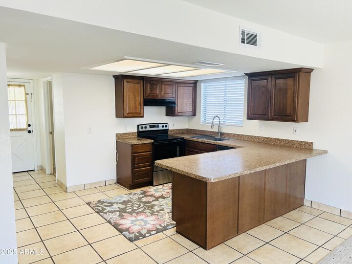 Property Photo:  323 W Olive Avenue  AZ 85233 