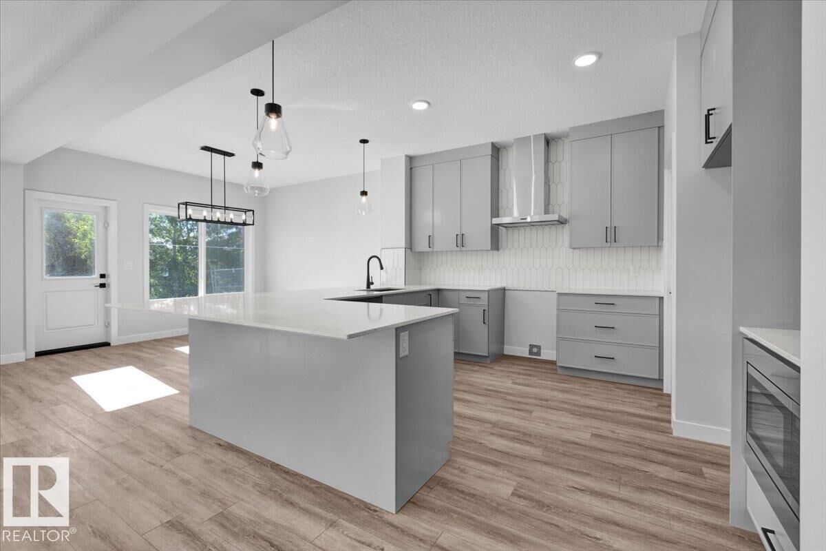 Property Photo:  215 Ravine Drive  AB T9G 0M2 