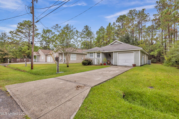 Property Photo:  6122 E Jackson Street  MS 39520 