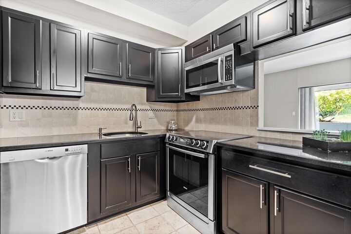 Property Photo:  31 Hamlin Ln B11  MA 02482 