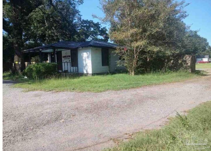 Property Photo:  10121 Chemstrand Rd  FL 32514 