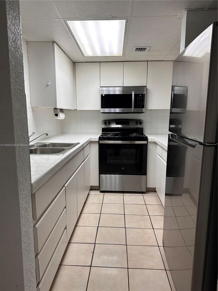 Property Photo: 1850 W 56th St 2201 FL 33012
