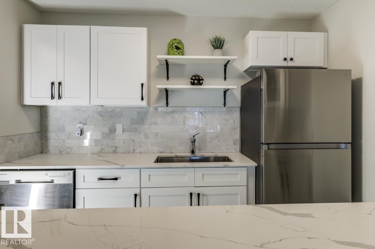 Property Photo: 10620 104 Street NW 105 AB T5H 2W2