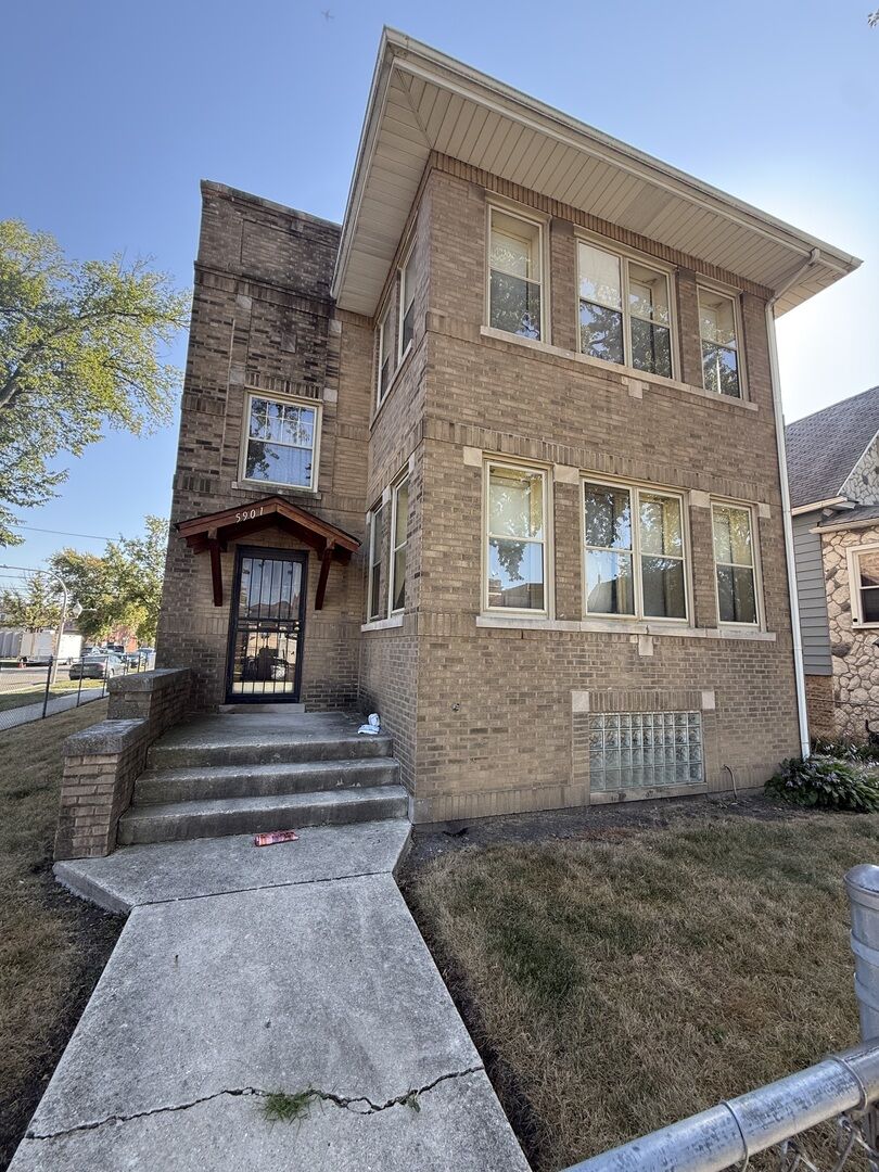 Property Photo:  5901 W Rice Street  IL 60651 