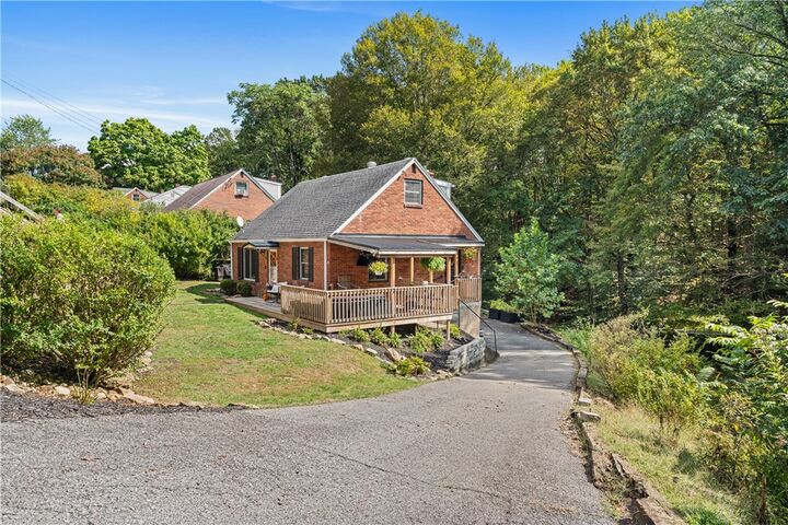 Property Photo: 115 Woodcock Drive PA 15001