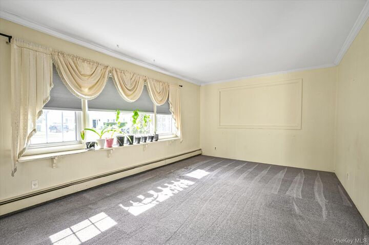 Property Photo:  11 Pittsburgh Avenue  NY 11758 