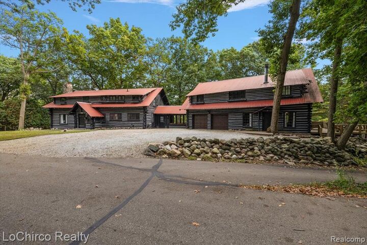 Property Photo: 8646 Thendara Boulevard MI 48348 3379