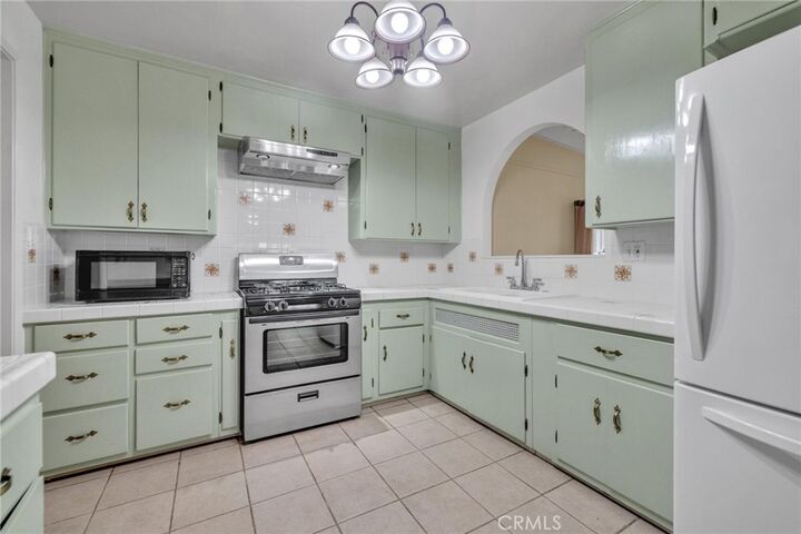 Property Photo:  8738 Olympic Boulevard  CA 90660 