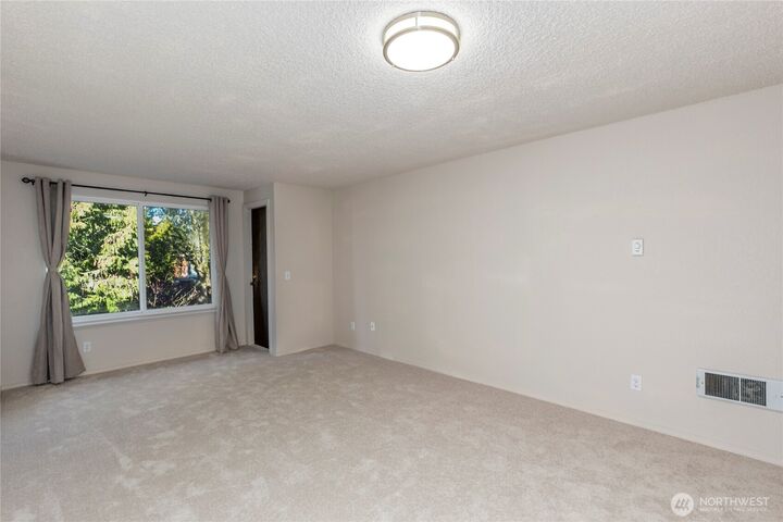 Property Photo: 8911 Holly Drive 207 WA 98208