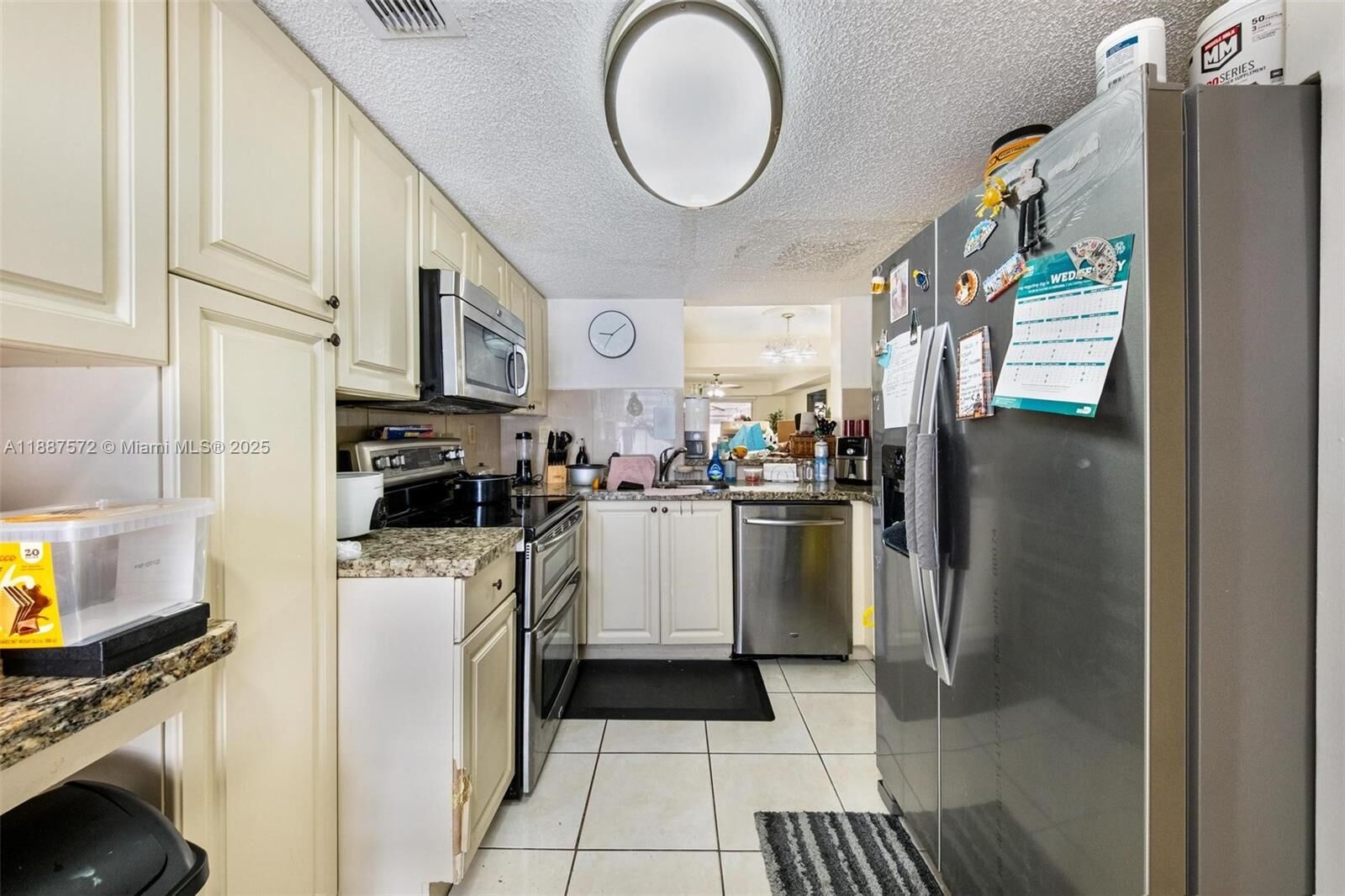 Property Photo: 1178 NW 123rd Pl 1210 FL 33182