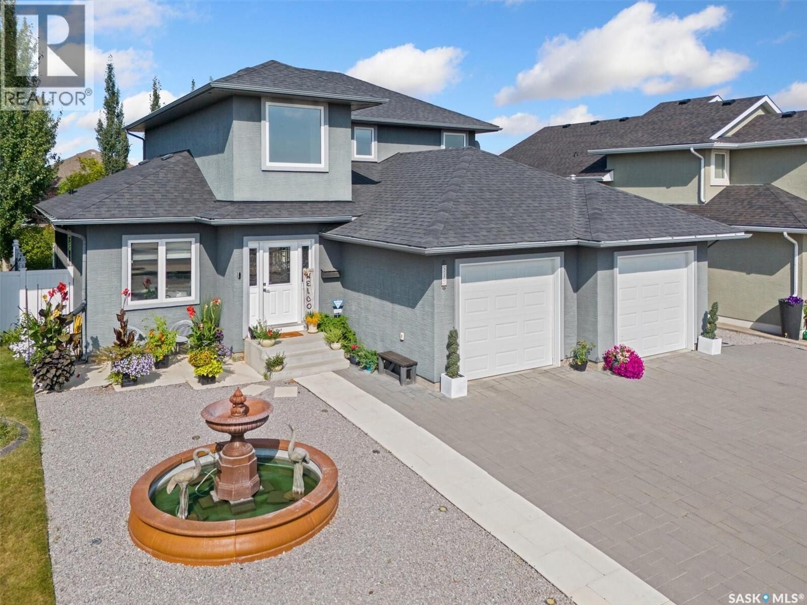 Property Photo:  210 Clubhouse Boulevard  SK S0K 4S1