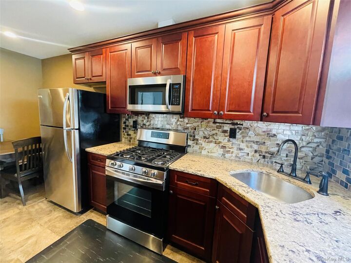 Property Photo:  47-32 39th Street  NY 11104 