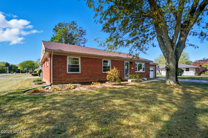 Property Photo:  210 Eastown Park Row  OH 45840 