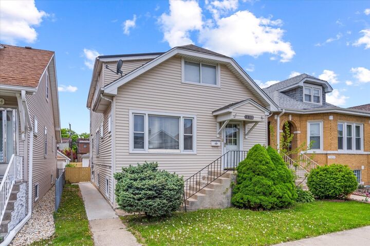 Property Photo:  2318 N 73rd Avenue  IL 60707 