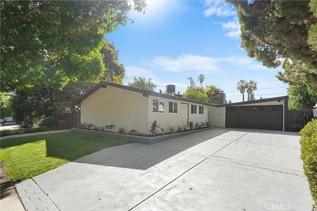 Property Photo:  8223 Garden Grove Avenue  CA 91335 
