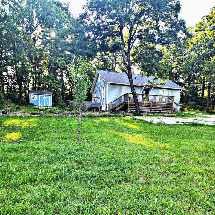 Property Photo:  10845 SW Campbell Road  AR 72701