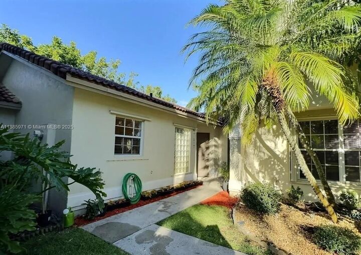 Property Photo: 317 NW 109th Ave FL 33026