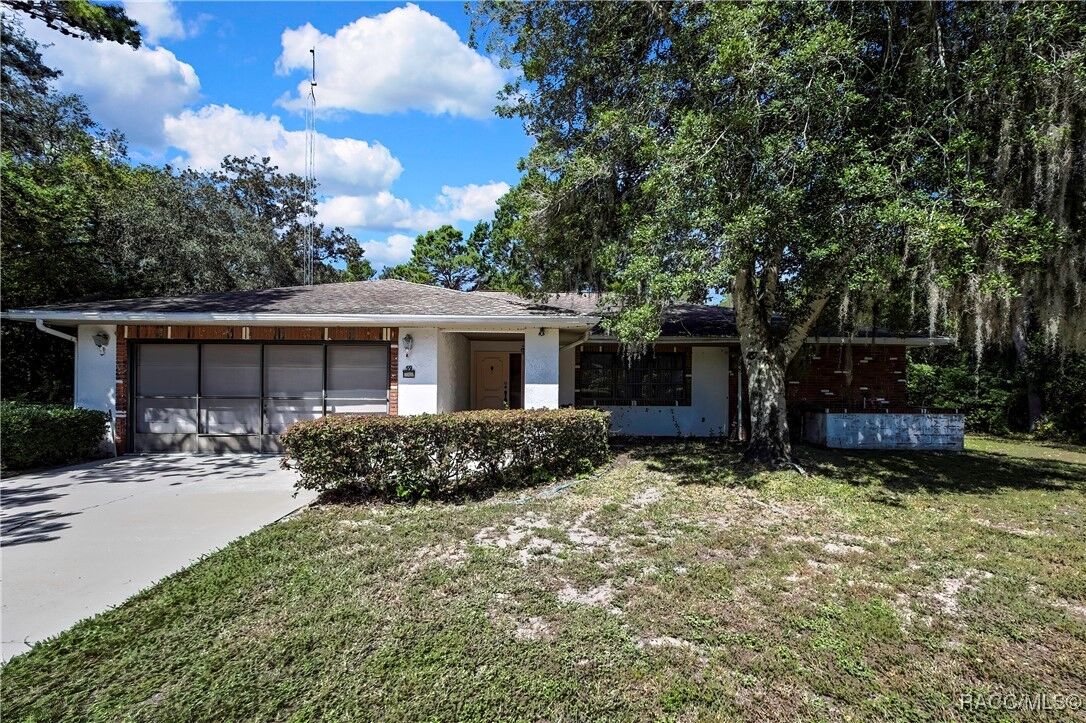 Property Photo:  59 & 61 Oak Village Boulevard  FL 34446