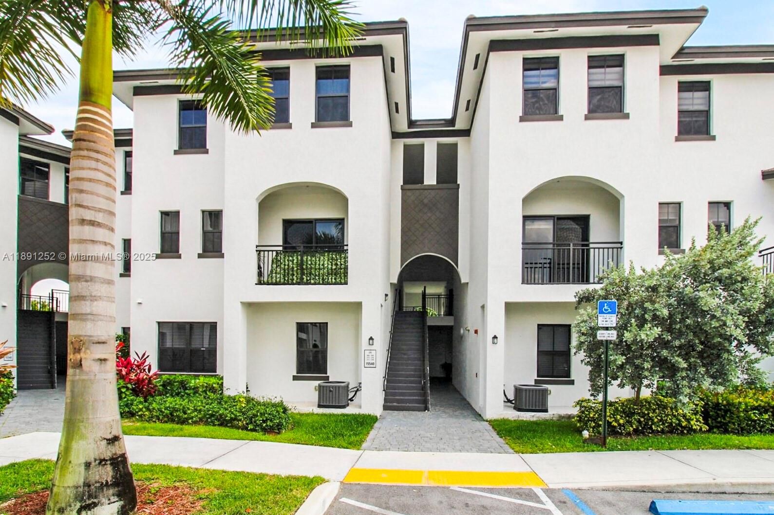 Property Photo:  15540 SW 136 St 204  FL 33196 