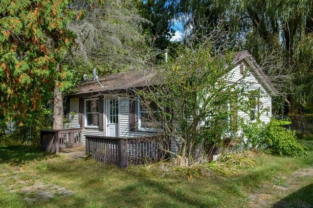 Property Photo:  3208 N Four Mile Road  MI 49686 