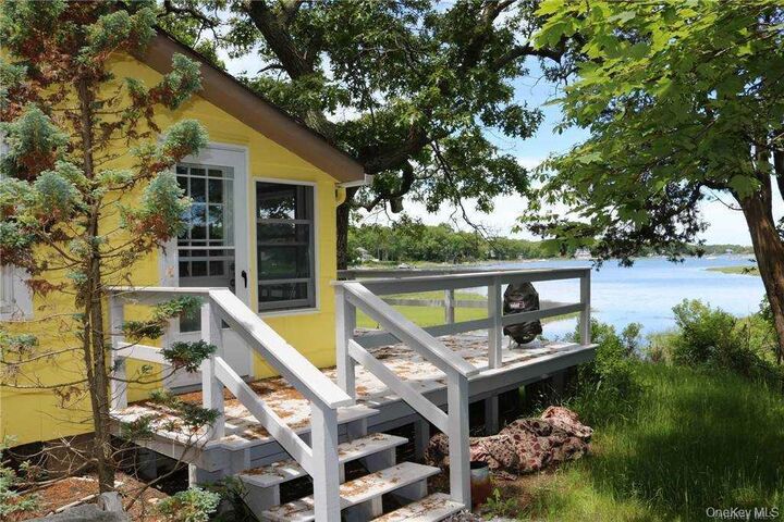 Property Photo: 875 Fleetwood Road NY 11935