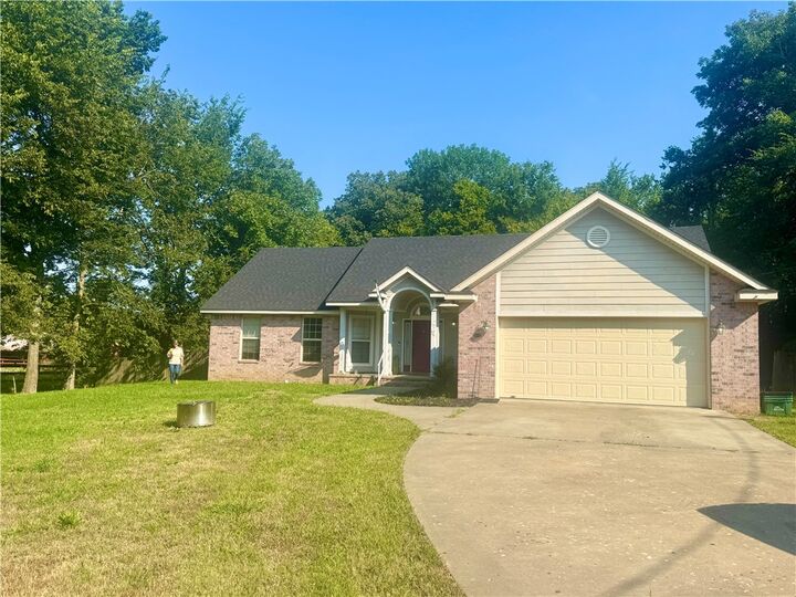 Property Photo: 100 W Greenwood Street AR 72701
