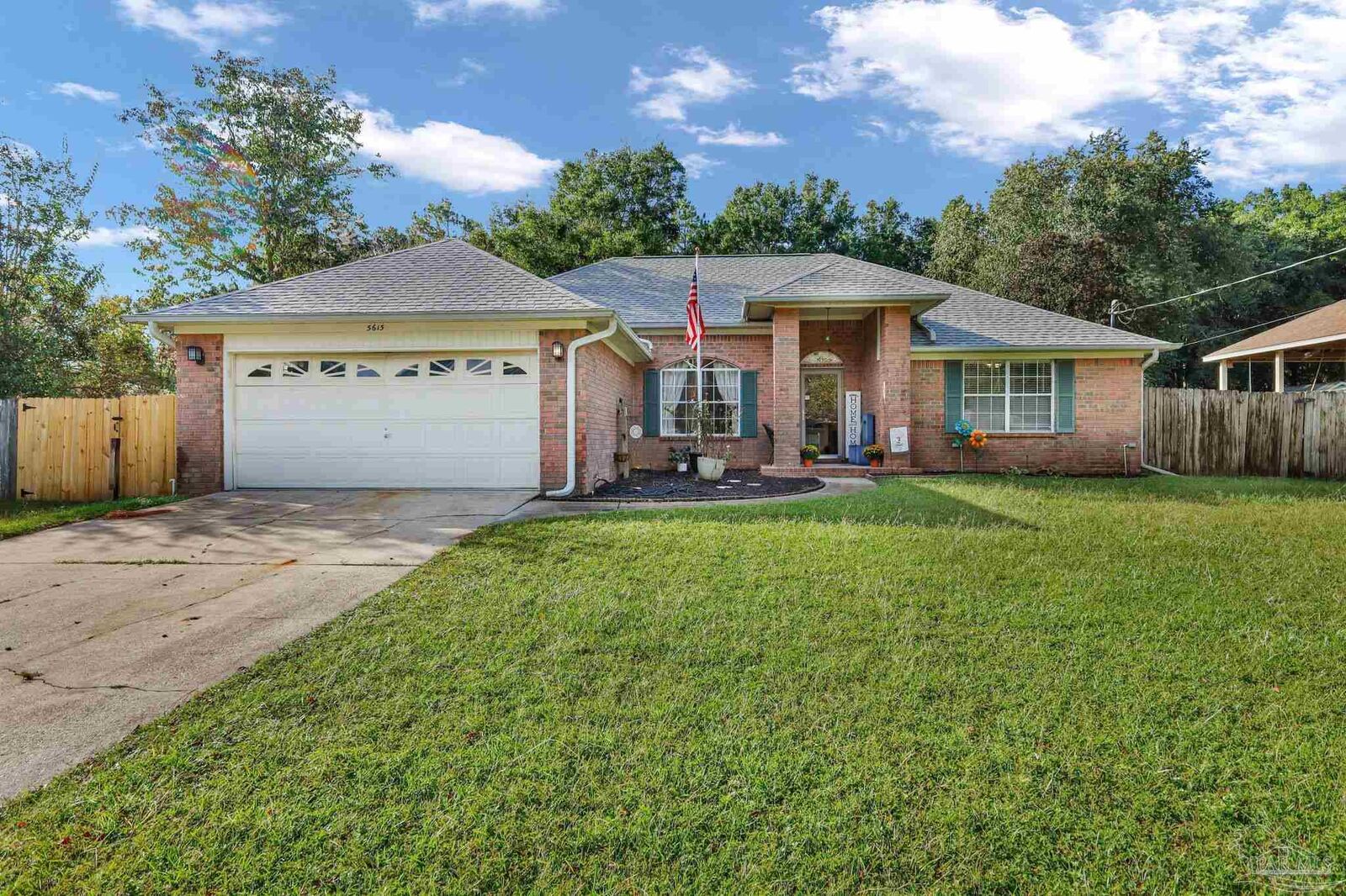 Property Photo:  5615 Whispering Woods Dr  FL 32571