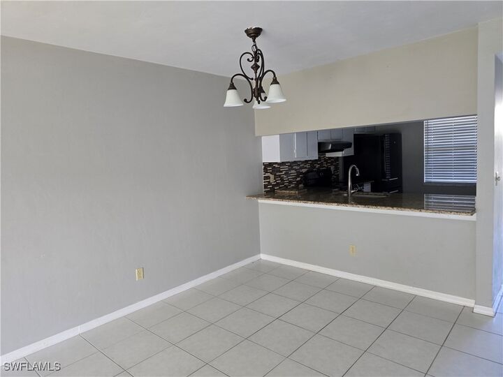 Property Photo:  2660 Kings Lake Boulevard 7-103  FL 34112 