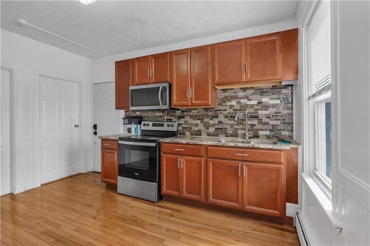 Property Photo:  48 Kenwood Street 1  RI 02909 