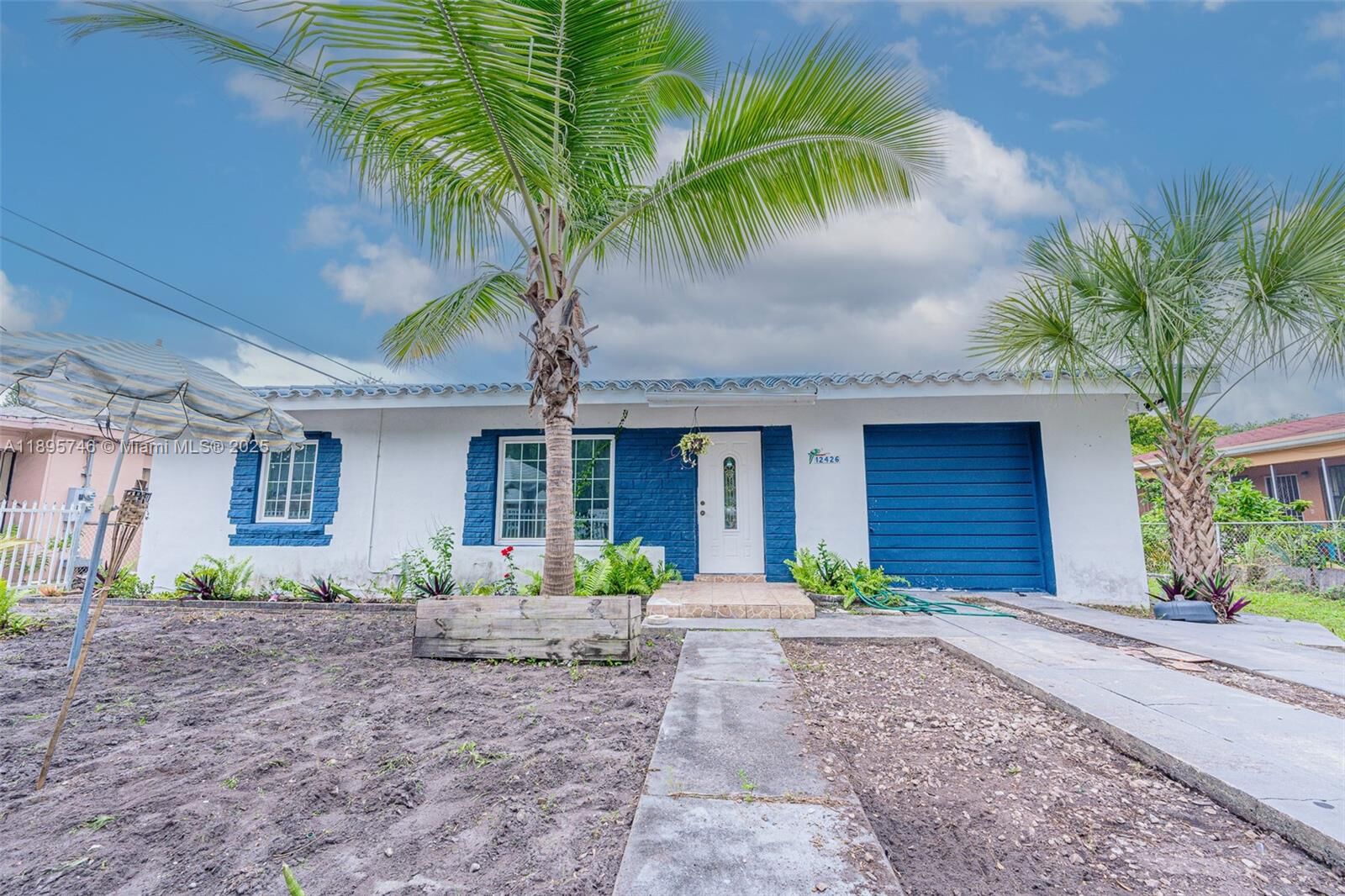 Property Photo:  12426 NW 8th Ave A  FL 33168 