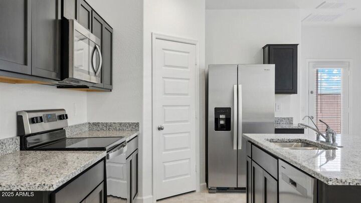 Property Photo:  1749 W Stealth Avenue  AZ 85120