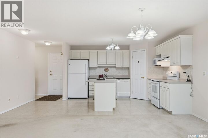 Property Photo: 210 934 Heritage View SK S7H 5R9