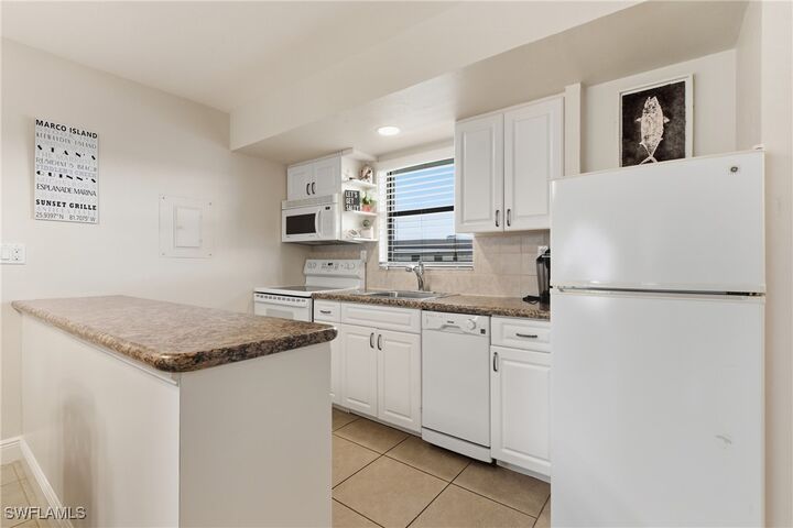Property Photo: 1023 Anglers Cove E503 FL 34145