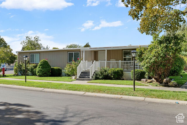 Property Photo: 1062 W Foxglove Dr 118 UT 84123