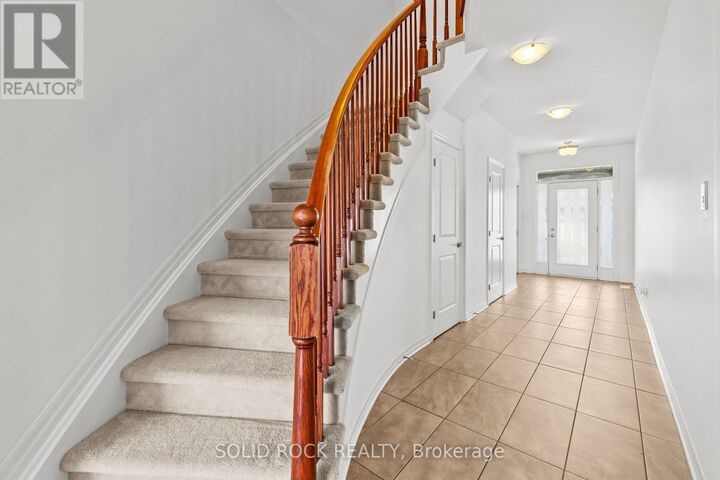 Property Photo:  153 Hawkshaw Crescent East  ON K2J 5P8 