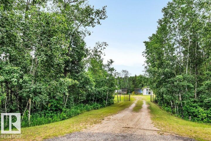 Property Photo:  24-51213 Rge Rd 261  AB T7Y 1B1 