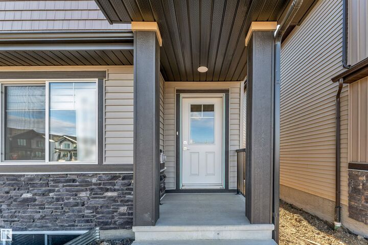 Property Photo: 1005 Aster Boulevard NW AB T6T 2W8
