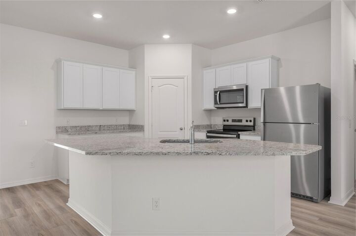Property Photo: 322 Amberjack Court FL 34759