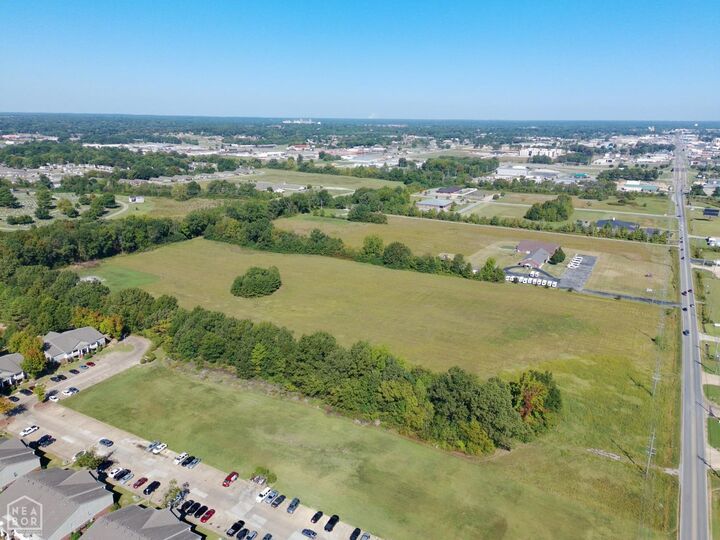 Property Photo:  3911 S Caraway Road  AR 72404