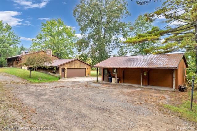 Property Photo: 4445 McDowell Road MI 48446