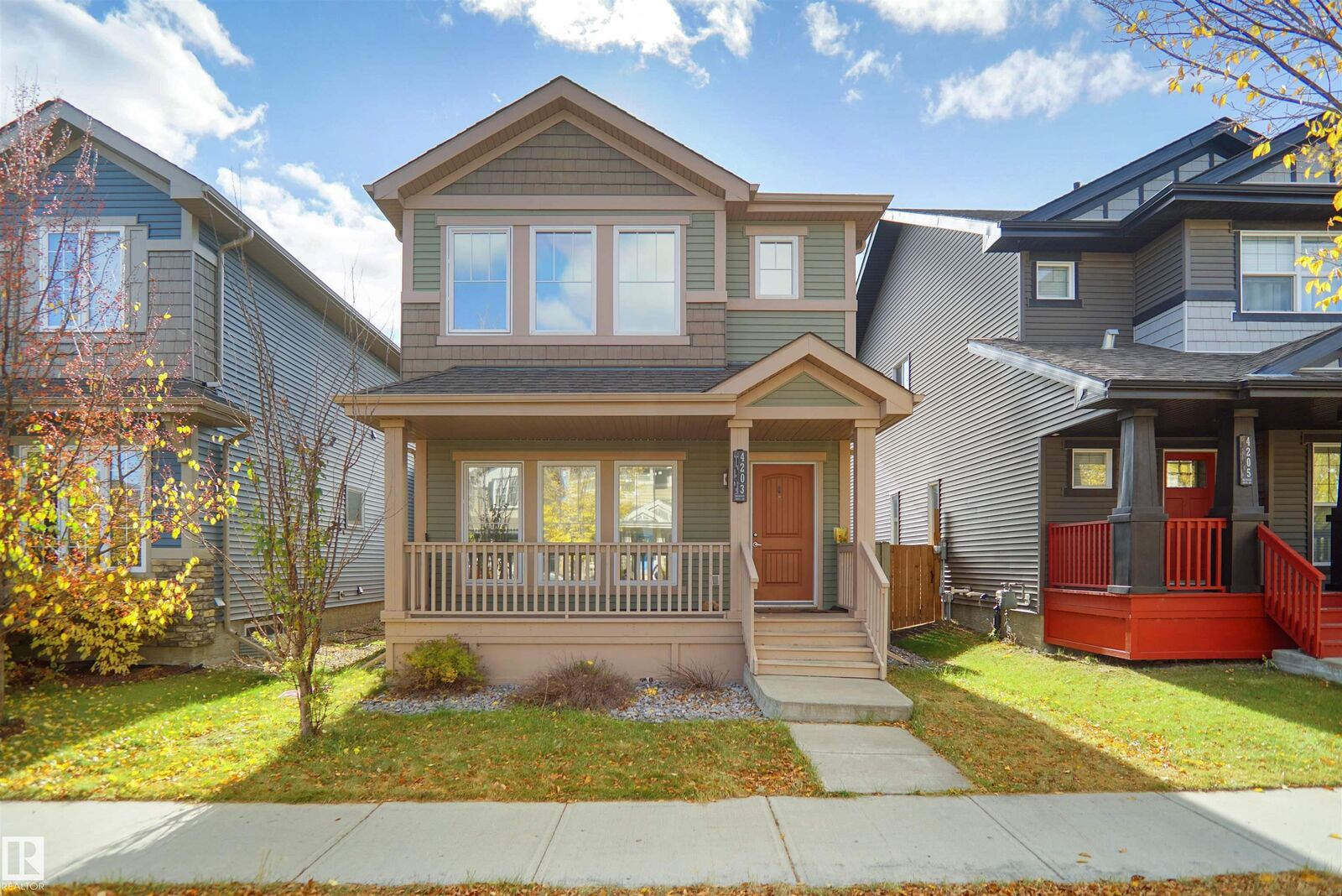 Property Photo: 4203 Orchards Drive SW AB T5X 3V3