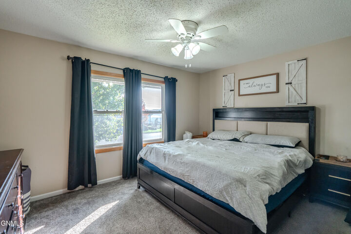 Property Photo:  4813 Roughrider Circle E  ND 58554 