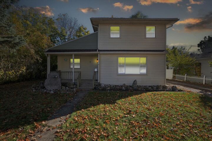 Property Photo:  332 N Dewey Street  MI 48867-2400