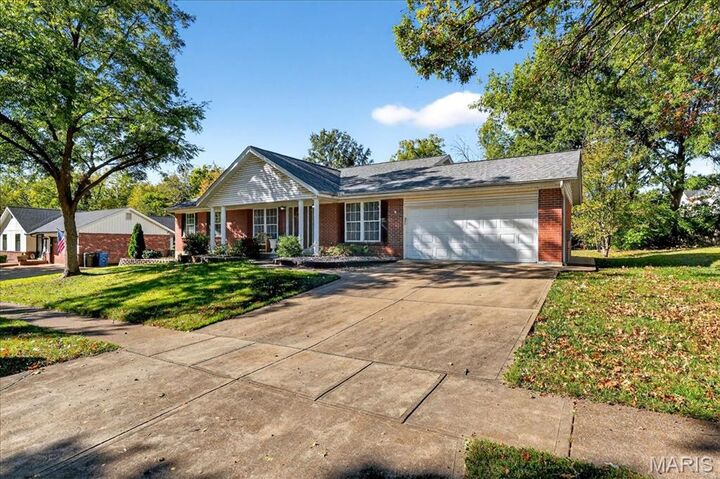 Property Photo:  10727 Roxanna Drive  MO 63128