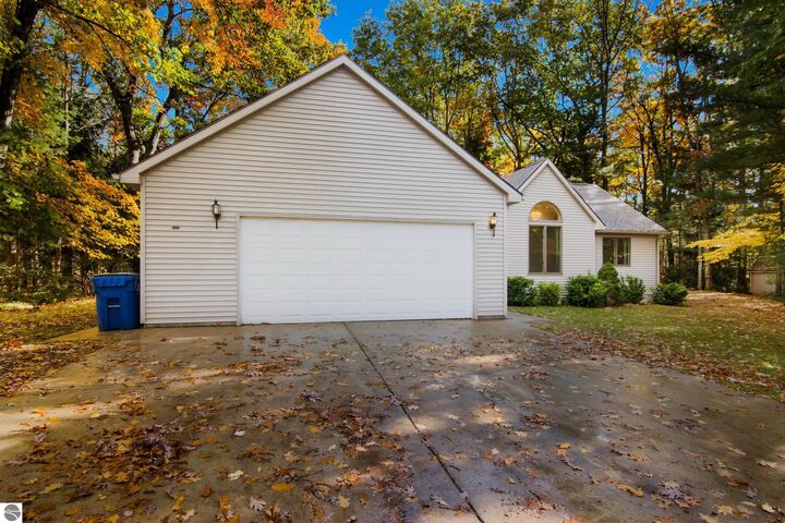 Property Photo:  5481 Timberwyck Trail  MI 49643