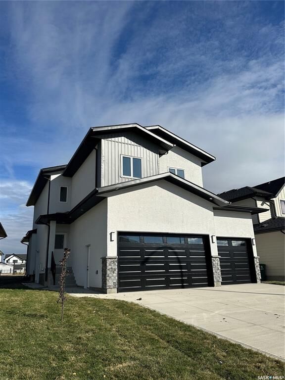 Property Photo: 147 Woolf Bend SK S7W 0L6