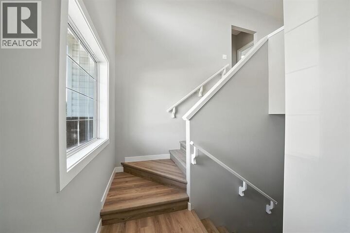 Property Photo:  84 Reynolds Road  AB T4S 0L8