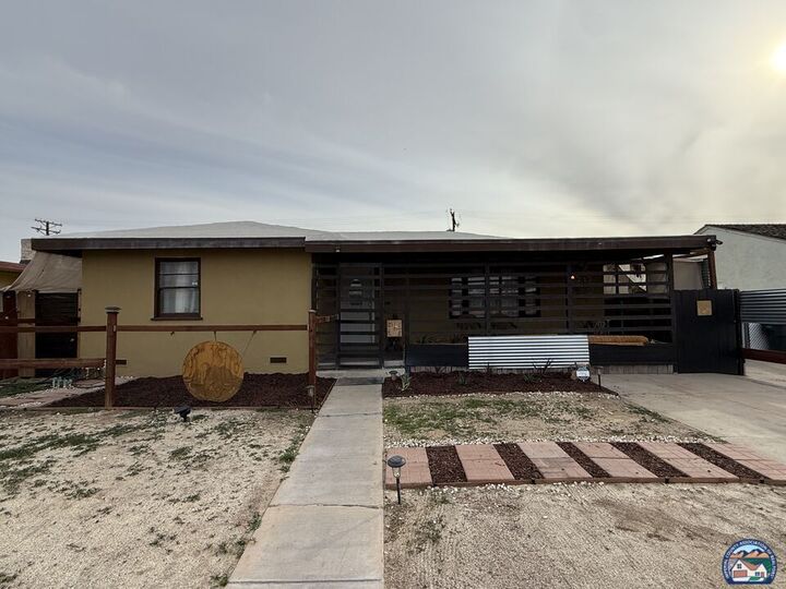 Property Photo:  1027  W Holt Ave  CA 92243 