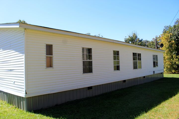 Property Photo: 609 Country Club Dr TN 37388